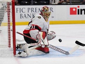Ottawa Senators goalkeeper Anton Forsberg (31) blocks a shot against the Anaheim Ducks during the first period at the Honda Center.