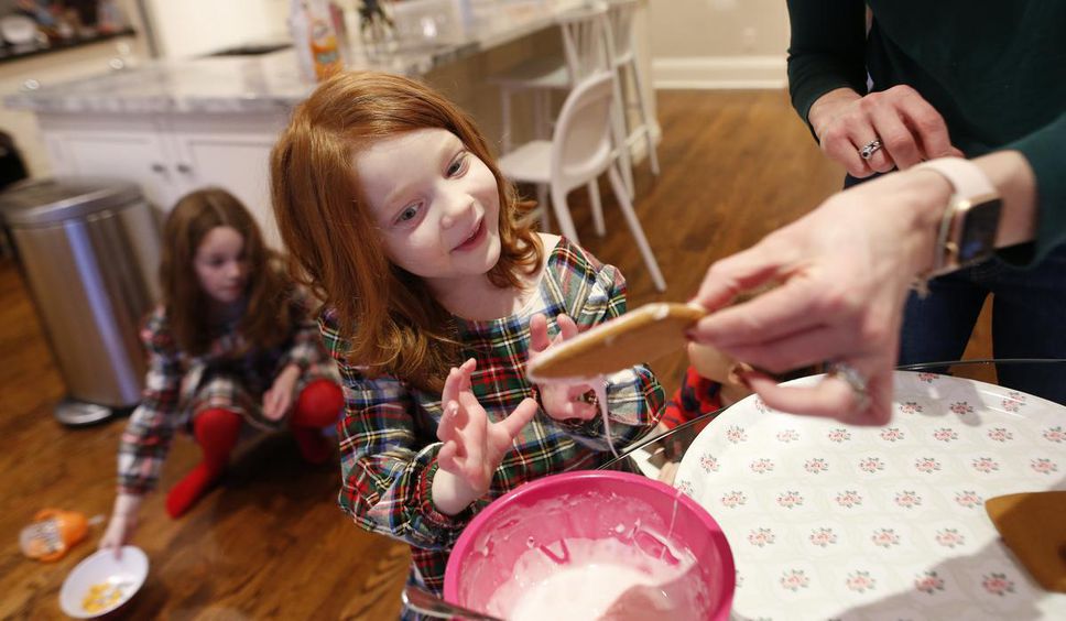 Isabella (Izzy) Tutsch, 5, helps make a gingerbread house while on vacation with her family.  Izzy is doing well after undergoing a liver transplant at Sick Kids Hospital in October.