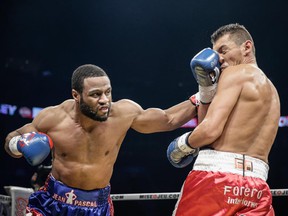 Jean Pascal de Laval connects with a left hand during the light heavyweight fight against Argentina's Roberto Bolonti at the Bell Center on December 6, 2014.