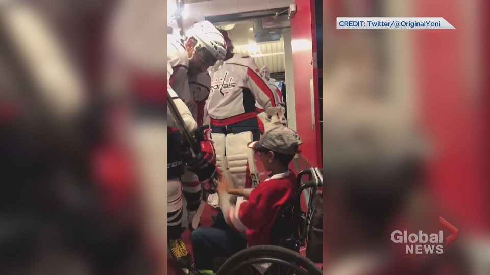 Click to play video: 'Alexander Ovechkin gives a hockey stick to a young fan in a wheelchair after the game in Calgary'