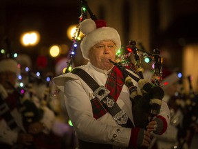 Pomp and pageantry: The Sun Parlor Pipes and Drums perform during the 53rd Annual Windsor Santa Claus Parade, Saturday, December 4, 2021.