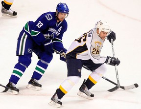 The speedy Steve Sullivan of the Nashville Predators, chased by Canucks center Henrik Sedin during a December 2009 NHL game at GM Place, played a major role in the development of Conor Garland's game while he was a player development coach. for the Arizona Coyotes.