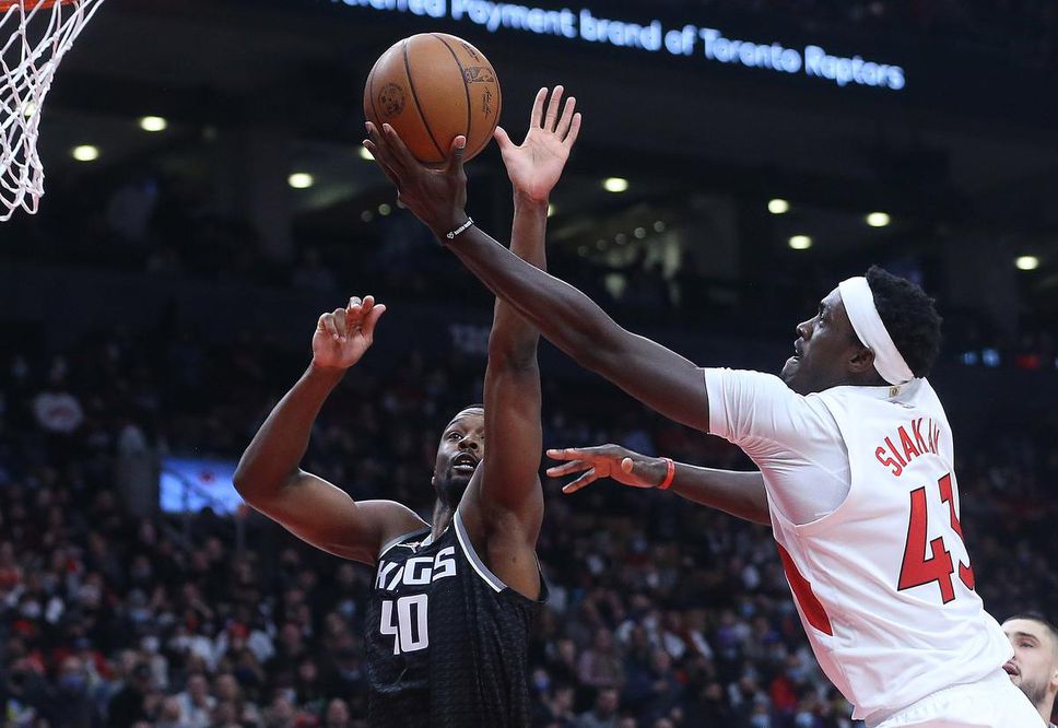 Pascal Siakam drives to the rim in the Raptors' win over Harrison Barnes and the Sacramento Kings on Monday night at Scotiabank Arena.