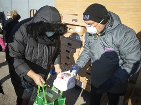 Rocco Tullio, CEO of Rock Development, delivered turkey dinners outside Sobeys in Tecumseh on Wednesday, December 22, 2021. Rock Development donated the turkeys while Sobeys donated $ 4,000 worth of potatoes, canned corn, bread and gravy.