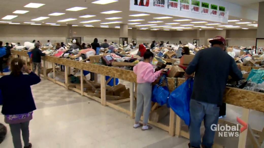 Click to Play Video: 'Customers Go' Crazy 'Over Calgary's Newest Discount Store' '