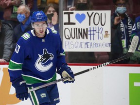 Canucks defender Quinn Hughes receives the love of Vancouver hockey fans ahead of an October game against the Minnesota Wild at Rogers Arena.