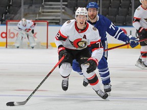 Thomas Chabot (72) of the Ottawa Senators chases back-up ice for a puck against the Toronto Maple Leafs during an NHL game at Scotiabank Arena on January 1, 2022 in Toronto, Ontario, Canada.