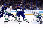 Thatcher Demko #35 of the Vancouver Canucks makes a save during a game against the Tampa Bay Lightning at Amalie Arena on January 13, 2022 in Tampa, Florida.