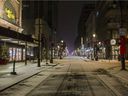 Ste-Catherine St. empties in Montreal on Saturday, January 1, 2022 after the 10 p.m. curfew.