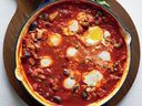Eggs in spicy tomato sauce with aubergine, from Lidia Bastianich's new cookbook.