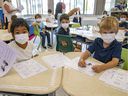 First graders wear masks in class at a Lester B. Pearson School Board elementary school on West Island on September 9, 2021.