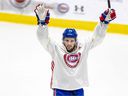 Montreal Canadiens defenseman Chris Wideman celebrates a white team victory during a practice competition at the Bell Sports Complex in Brossard on January 10, 2022.
