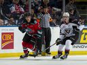 Connor Horning (far right, keeping then-Kelowna Rocket Ethan Ernst in check during a December 2019 WHL game at Kelowna's Prospera Place) is one of three 20-year-olds on the Vancouver Giants.  