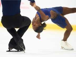 Vanessa James and Eric Radford from Canada skate in pairs competition at the Skate Canada Autumn Classic International in Pierrefonds, Que., On September 16, 2021. They both tested positive for COVID-19 in late December.