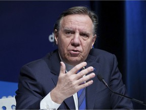 Quebec Premier François Legault answers a question during a press conference in Montreal, Tuesday, January 11, 2022.