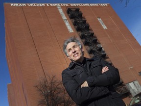 Exciting plans for Olde Walkerville.  Mike Brkovich, owner of Walkerville Brewery, photographed in front of the old shelves of the original Walkerville distillery, Tuesday, January 11, 2022.