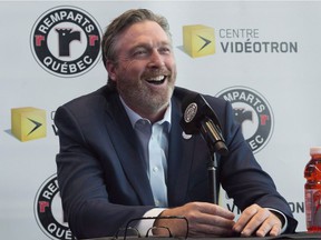 Hall of Fame goalkeeper Patrick Roy smiles as he announces his return to Quebec Remparts as general manager and head coach on April 26, 2018 in Quebec City.