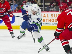 Vancouver Canucks left wing Tanner Pearson (70) takes a shot in the slot against the Carolina Hurricanes during the second period at PNC Arena.