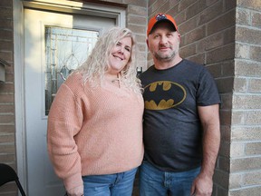 Tracy Kell (left) and her husband Joel Morris (right) at their home in Windsor on January 14, 2022.