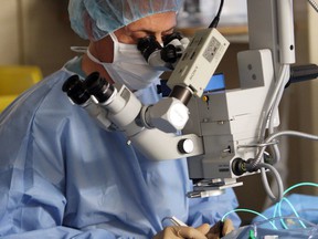Dr. Fouad Tayfour performs eye surgery on a patient in this 2011 file photo.