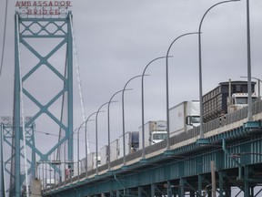 Some industry sources are concerned fewer trucks will cross the Canada-U.S. border after a Canadian ban on unvaccinated drivers begins Saturday.  A similar ban planned for US-bound truckers begins on Saturday, January 22.  Commercial platforms are shown lining up to enter Canada on the Ambassador Bridge on Friday.