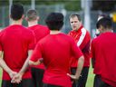 Colin Elmes talks to TSS Rovers players at practice at Swangard Stadium.  Rovers supporters are launching an initiative to help fund the club, which aims to provide another development path for aspiring professionals, both men and women. 