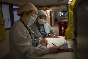 Frontline medical staff work on the CTU floor at Windsor Regional Hospital's Ouellette campus during the COVID-19 pandemic, in this May 13, 2020 file photo.