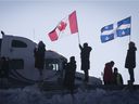 Supporters of the Freedom Convoy show their support at Montée Lavigne in Rigaud on Friday Jan. 28, 2022.