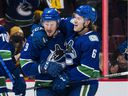 The sheer will and drive of Canucks forward JT Miller (left), celebrating one of his 15 goals this season with teammate Brock Boeser, can't be questioned.