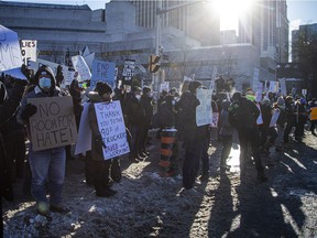OTTAWA -- Thousands gathered in the downtown core for a protest in connection with the Freedom Convoy that made their way from various locations across Canada and landed in Ottawa, Saturday February 5, 2022. A counter protest took place on the front lawn of City Hall and Convoy protestors faced off from Confederation Park. 



ASHLEY FRASER, POSTMEDIA