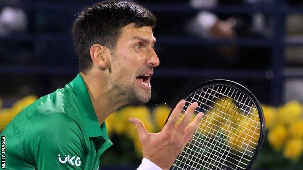 Djokovic is animated on court in Dubai where he eased into round two