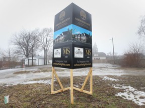 A billboard advertising a new apartment complex in the 1400 block of Lesperance Road on Tecumseh is shown on Tuesday, February 22, 2022.