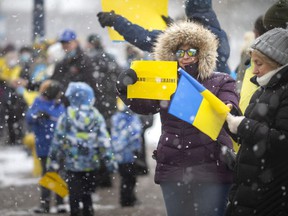 Members of Windsor's Ukrainian community hold a rally on Ottawa Street at Lanspeary Park to show support as Ukraine defends itself against a Russian invasion, on Friday, February 25, 2022.