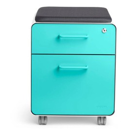 A splash of color helps to liven up a home office space.  Poppin Mini Stow 2-Drawer File Cabinet, aqua, $299, Staples.ca