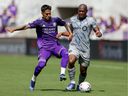 Orlando City midfielder Facundo Torres (17) and CF Montréal defender Kamal Miller (3) fight for possession in the first half on Sunday, Feb. 27, 2022.