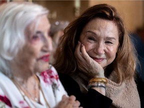 Mary Katz, who turned 107 years old in Montreal on Sunday February 27, 2022, is watched by her daughter Carrie Katz.