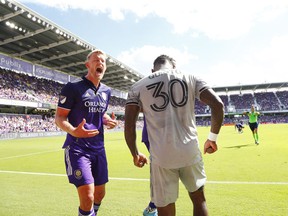 CF Montréal forward Romell Quioto (30) gets called for a red card as he shoves Orlando City SC defender Robin Jansson (6) during the second half at Orlando City Stadium Sunday, Feb. 27 in Orlando, Fla.