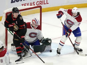 Ottawa Senators' Brady Tkachuk (7) tries to find the puck in front of Montreal Canadiens goaltender Andrew Hammond on Saturday night.