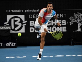 Montreal's Félix Auger-Aliassime serves during his quarter-final match against Ilya Ivashka of Belarus at the Open 13 event in Marseille, France, on Feb. 18, 2022.