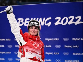 Canada's Justine Dufour-Lapointe reacts after her run in the freestyle skiing women's moguls final during the Beijing 2022 Winter Olympic Games at the Genting Snow Park A & M Stadium in Zhangjiakou on February 6, 2022.