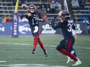 Montreal Alouettes quarterback Trevor Harris throws a pass to Christophe Normand during second half against the Winnipeg Blue Bombers in Montreal on Nov. 13, 2021.