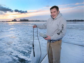 Winterwatch.  Mike McKay, executive director of the Great Lakes Institute for Environmental Research, is shown with a water quality monitor along the Detroit River shoreline in Windsor on Friday, Feb. 4, 2022.
