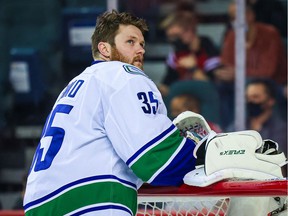 Thatcher Demko (35) looks on during the third period against the Calgary Flames at Scotiabank Saddledome.