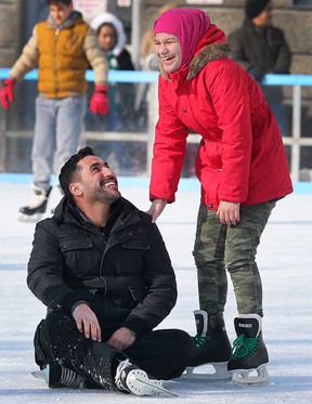 Nasser Alissa and his daughter Sharine share some smiles at the fourth annual newcomer skating event at Charles Clark Square in downtown Windsor on Feb. 2, 2019.