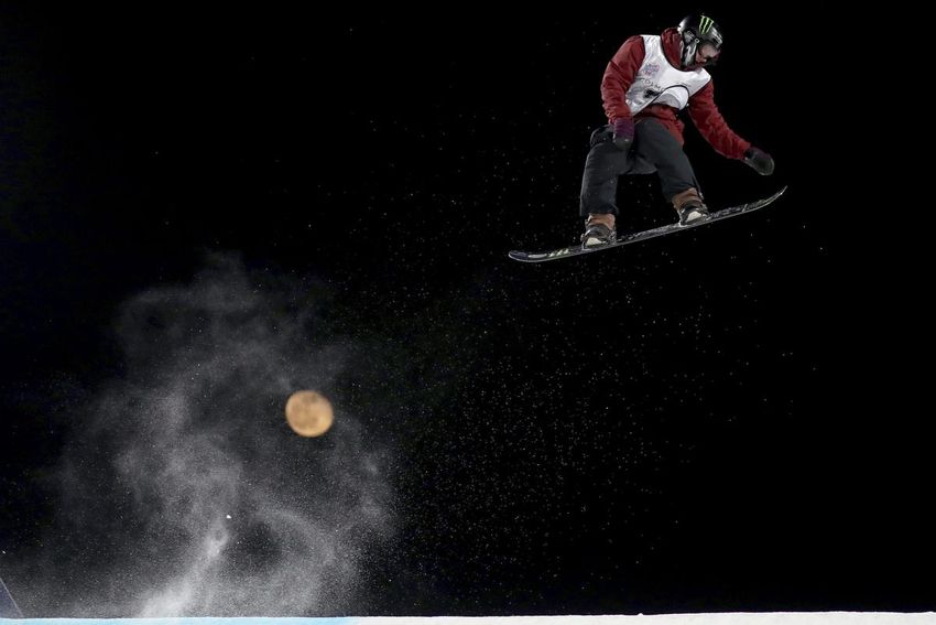Canada's Darcy Sharpe jumps into the Men's Snowboard Big Air for the 2019 FIS Big Air World Cup on December 14, 2019 on December 14, 2019. The 24-year-old is among 52 Canadian snowboarders and freestyle skiers competing against the world's best Friday to Sunday at ' A World Cup in Calgary.