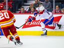 Montreal Canadiens defenseman Ben Chiarot (8) shoots the puck against the Calgary Flames during the third period at the Scotiabank Saddledome on March 3, 2022.