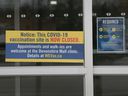 COVID-19 signage is shown at the main entrance at the WFCU Center on Monday, February 28, 2022.