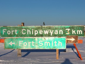 A sign outside Fort Chipewyan, Alta., directing motorists to the northern Alberta hamlet and to Fort Smith, NWT.