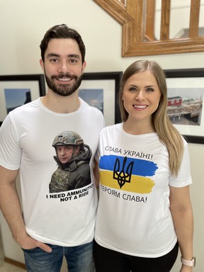 Natalia Kostiuk and Dylan Cliff wearing the t-shirts they are selling to support the Friends of Ukraine Defense Forces Fund.  T-shirts available at Standwithukraineproject@gmail.com