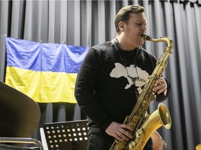 Jazz musician Bogdan Gumenyuk on saxophone during a benefit concert for the people of Ukraine at the Ukrainian National Federation on Fairmount Ave. on Sunday, March 6, 2022.